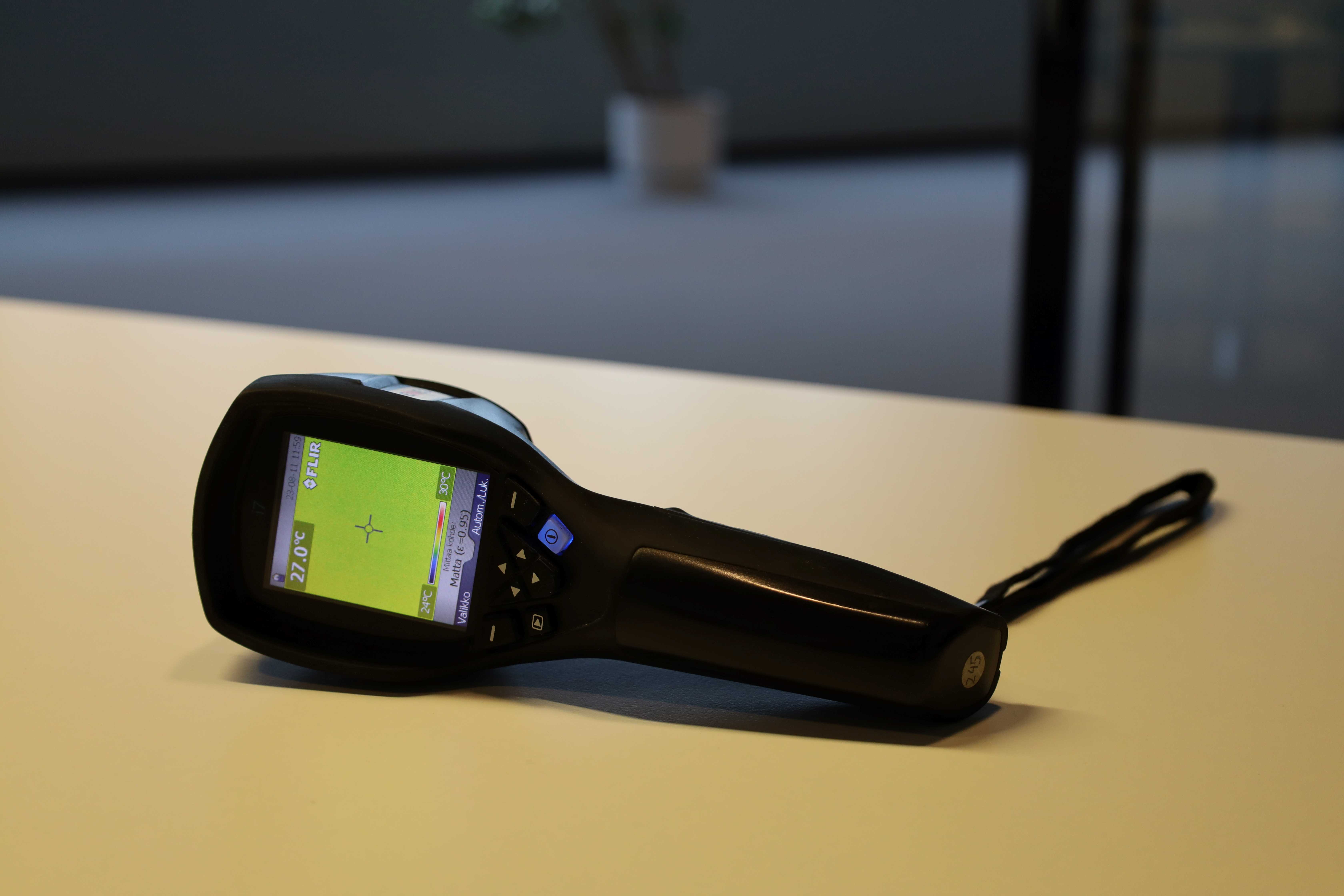 A thermal camera on a table.